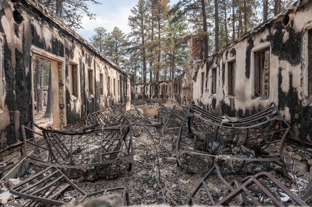 Inside the Horseshoe Lodge and Retreat Center in Beulah during a tour of the Aspen Acres Fire damage