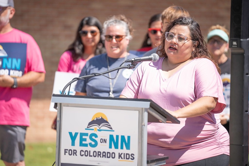 Anna Valencia, a Pueblo School District 60 early childhood educator, speaks during a press conference in support of Colorado Proposition NN
