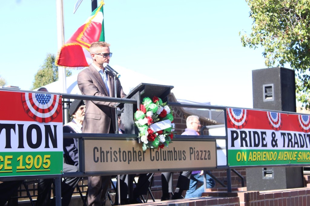 A Columbus Day celebration in front of the Pueblo monument