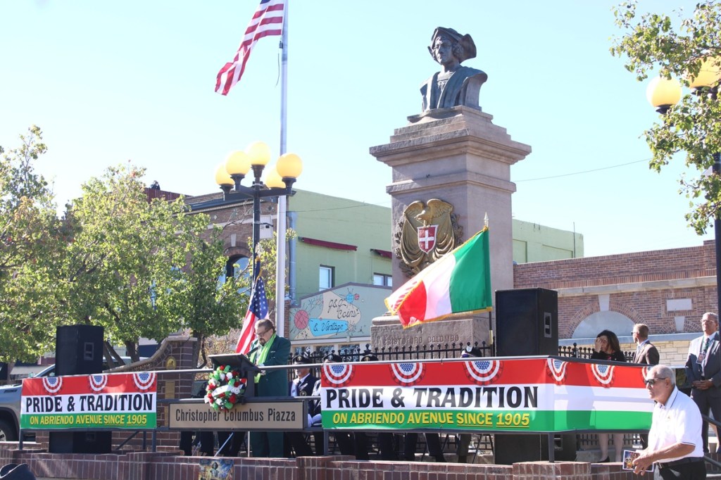 A Columbus Day celebration in front of the Pueblo monument